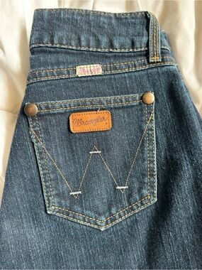 Wrangler Premium Patch Jeans in Dark Blue Denim with Contrast Stitching